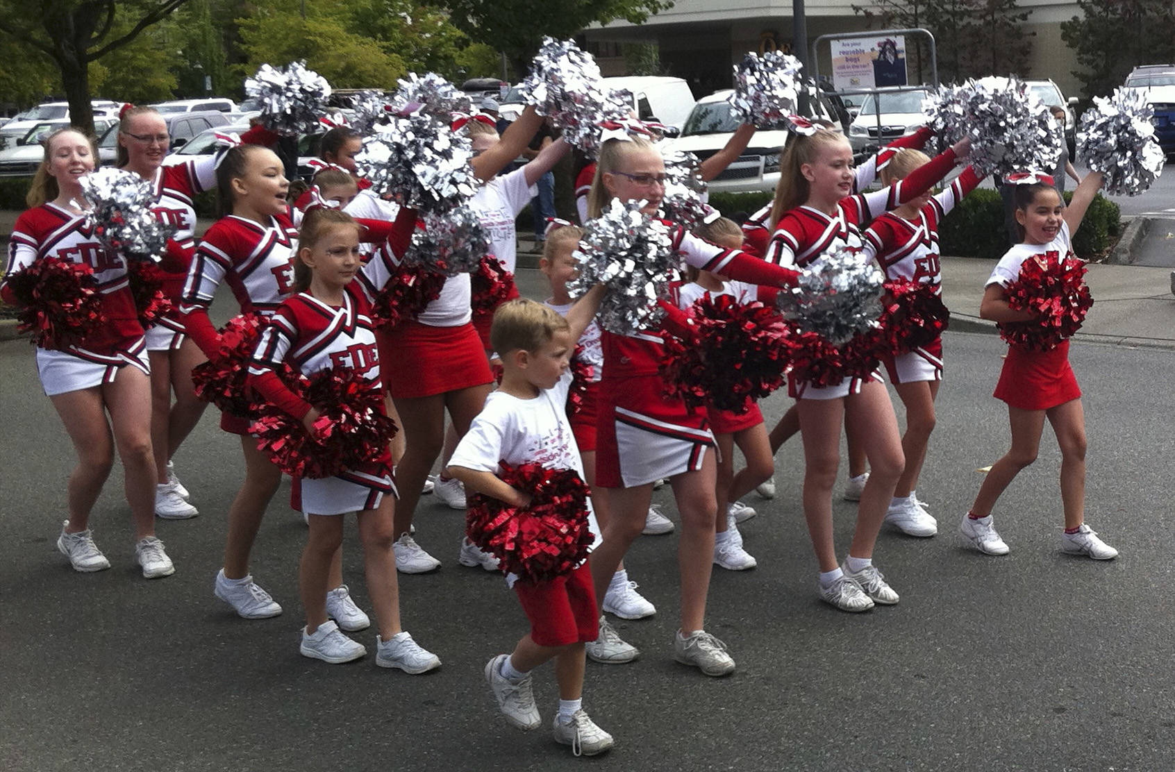 A group of Eastside Dream Elite cheerleaders march in the Mercer Island Summer Celebration Parade in 2016. Photo courtesy of Anne Christiansen