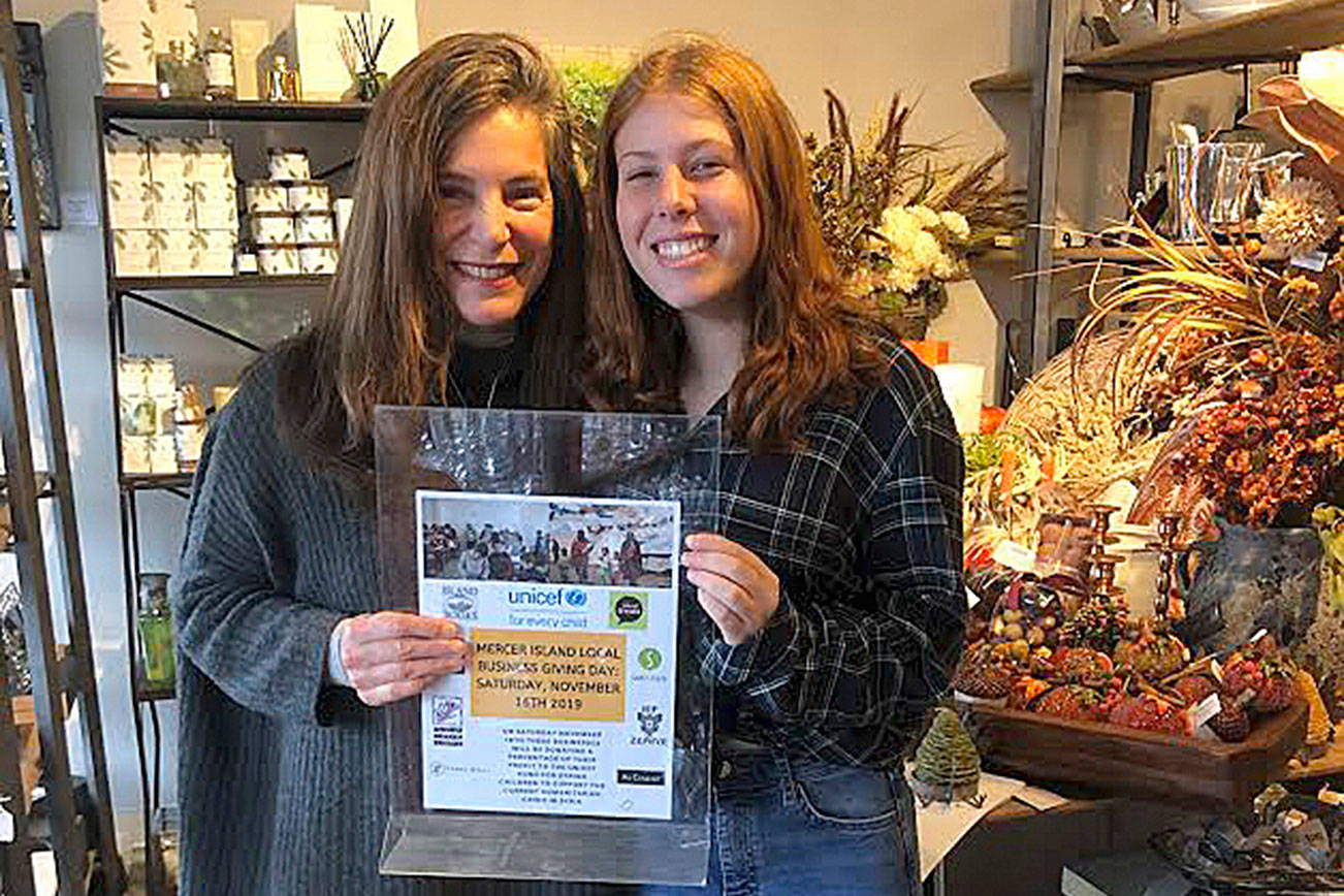 Terra Bella owner Nancy Meade and Bella Hartman on Nov. 16 raising money for refugees through UNICEF. Courtesy photo