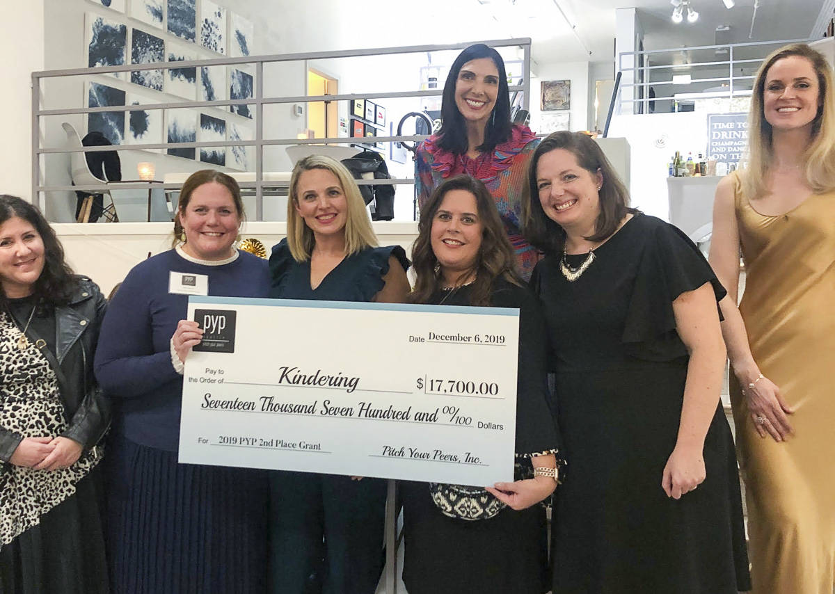 At a Dec. 6 event, Pitch Your Peers (PYP) Seattle presented a grant award of $17,700 to Kindering. From left: Kindering community engagement officer Anna Brown, Kindering chief development officer Alison Morton, PYP grant champion — who pitched Kindering — Erin Azose, Kindering CEO Lisa Greenwald, PYP co-founder and president Erin Krawiec, Kindering assistant development director Jennifer Schumacher, and PYP co-founder and vice president Alison Burks. Courtesy photo.