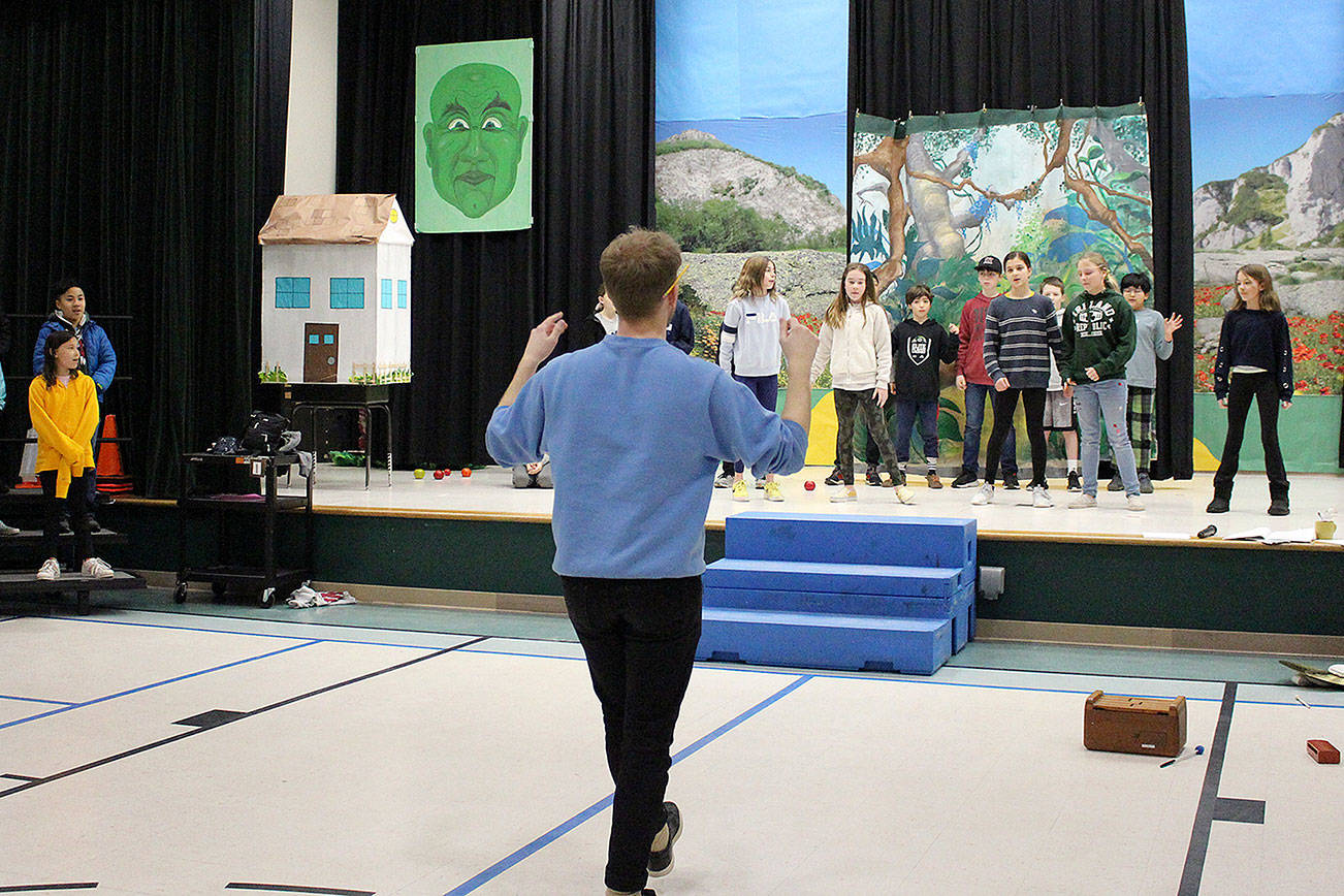 Music teacher Tyler Stevens rehearses the fifth-grade operetta on Feb. 28. Madison Miller/staff photo