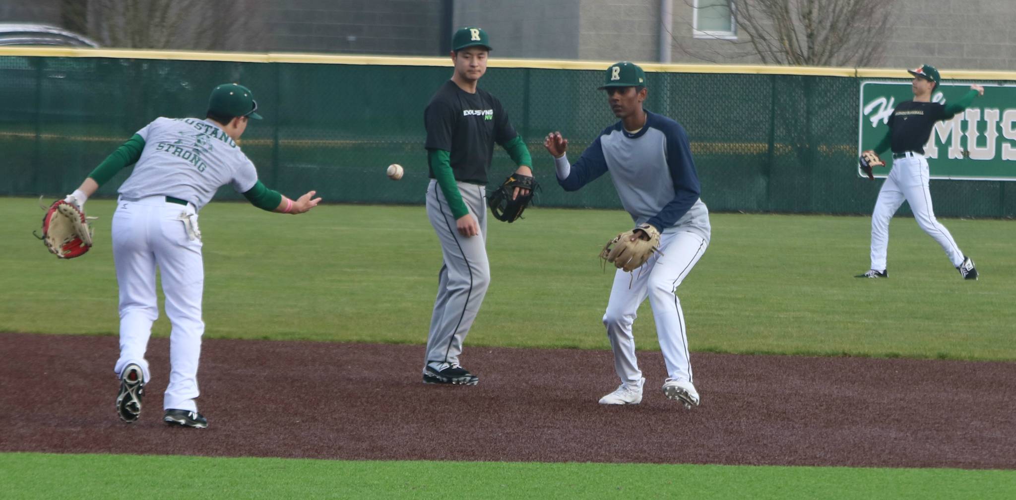 Redmond High’s baseball team gets in a workout on March 11. Andy Nystrom/ staff photo