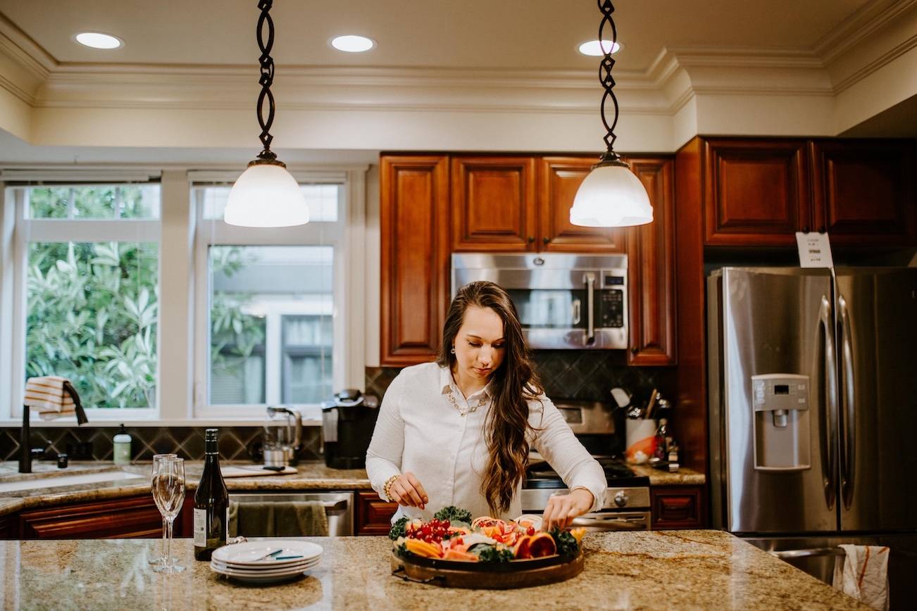 Goodness Grazers’ owner and founder Maggie Dickinson preparing a platter. Photo courtesy Maggie Dickinson