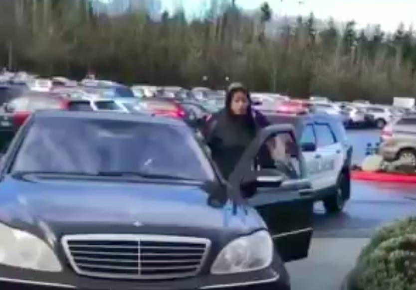 A screenshot of the video circulating on twitter showing a Bellevue Police Officer restraining a woman and forcing her to the ground. The video is now identified as an incident from Dec. 23, 2018.