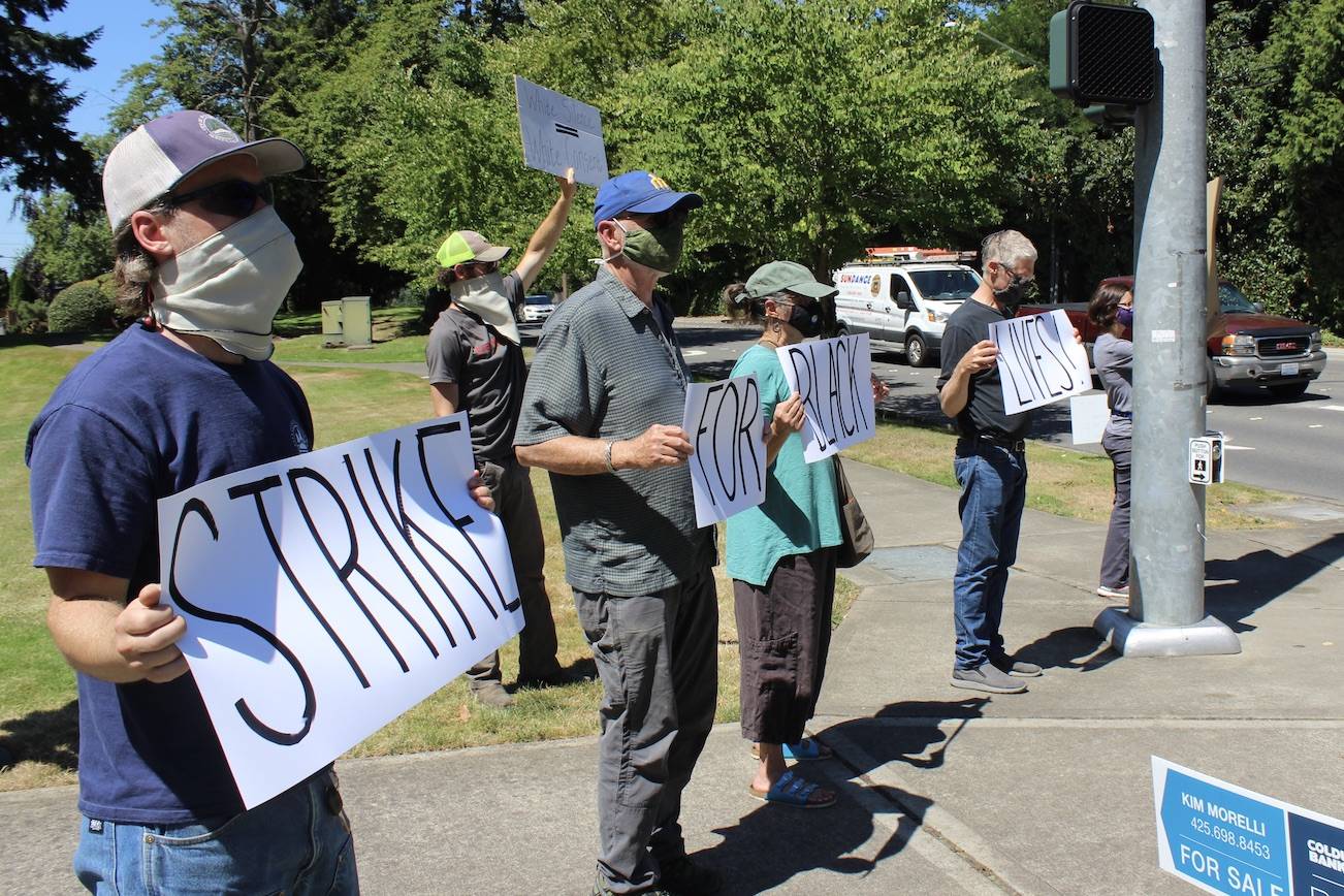 Protestors gathered for about a half-hour Monday. Blake Peterson/staff photo