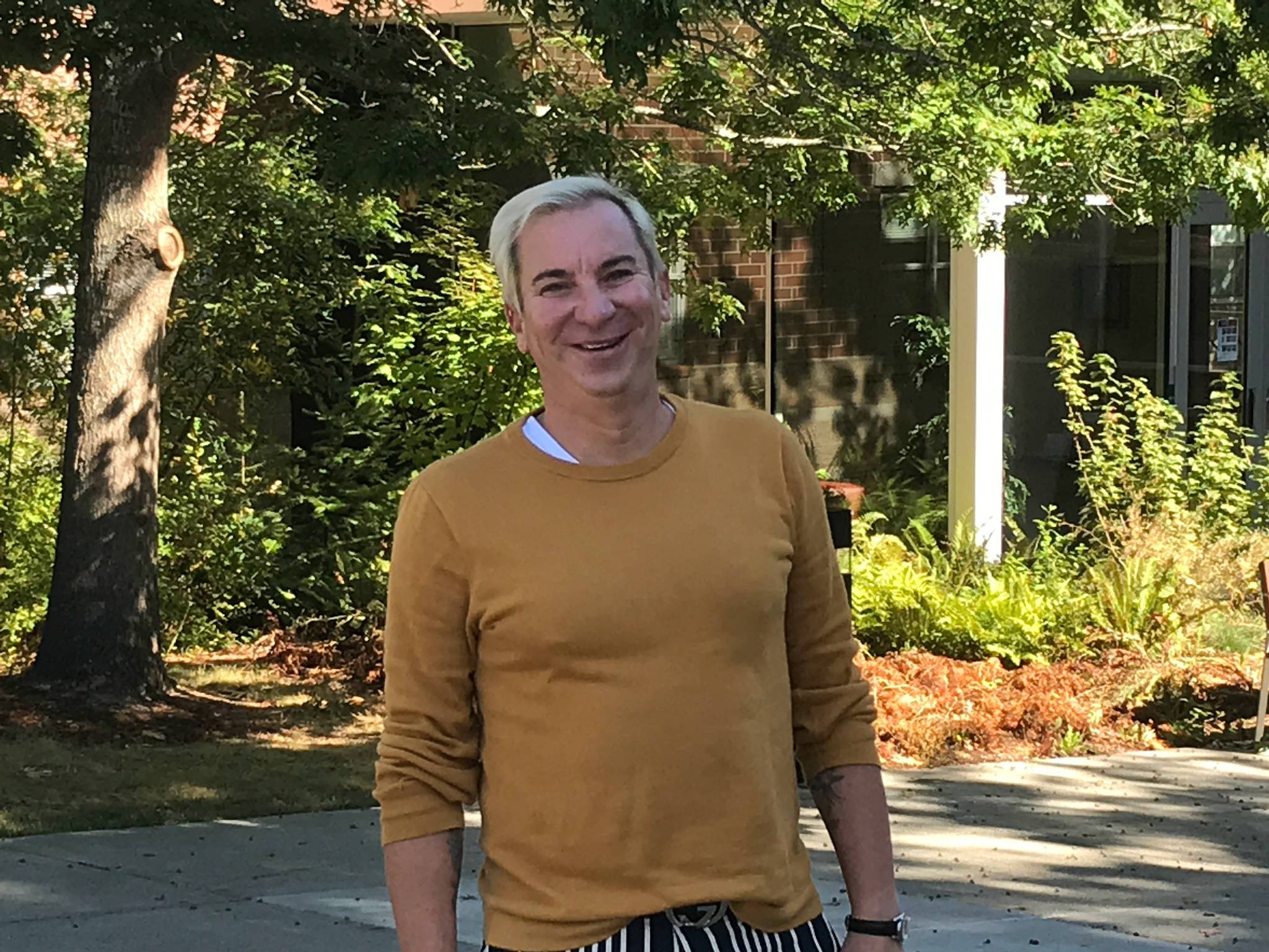 New Mercer Island High School Principal Walter Kelly stands in front of the school last week. Photo courtesy of the Mercer Island School District