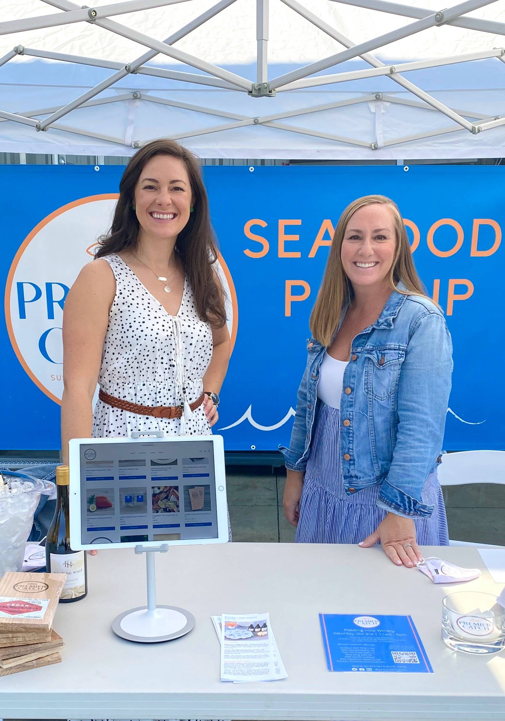 Ashley Besecker, left, and Joci Besecker are sisters-in-law and co-owners of Mercer Island’s Premier Catch. Photo courtesy of Amy Haag