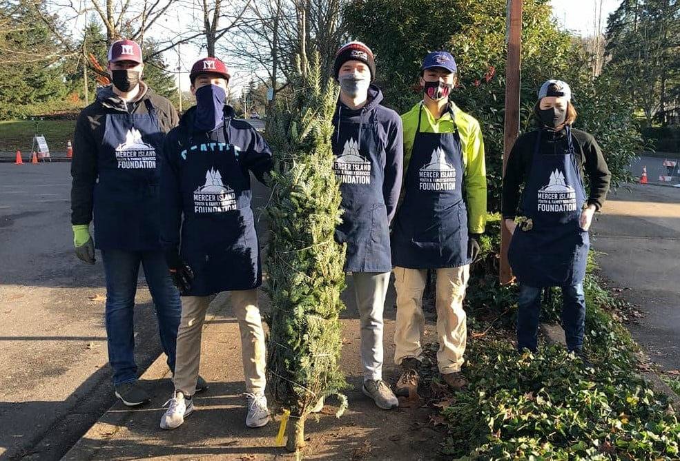 The Mercer Island Youth and Family Services Foundation netted a total of $44,000 after expenses at its fundraising holiday tree lot this year in Town Center. All donations received will support the city’s food pantry directly, as well as provide general support for important social services programs delivered by the city in 2021. Over the course of three weekends, approximately 75 volunteers helped sell 1,100 trees and wreaths. More than 400 customers made an additional donation on site. Courtesy photo