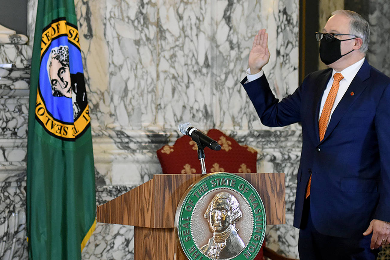 Jay Inslee takes the oath of office for his third term as governor. (Governor Jay Inslee)