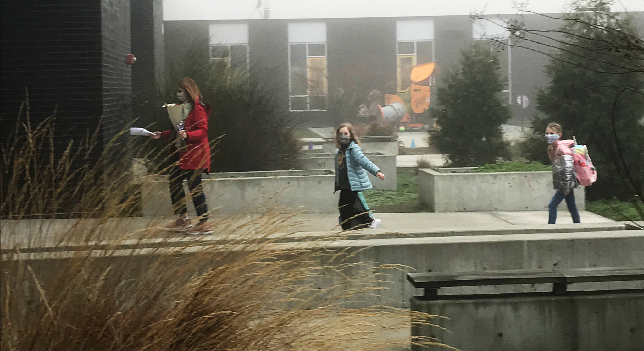 Mercer Island School District first-graders returned to in-person classes on Jan. 19. Here, Northwood Elementary School students head into the building. Photo courtesy of the Mercer Island School District