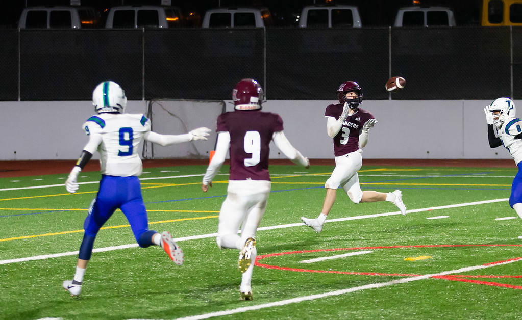 Mercer Island’s Jack Durner snags a touchdown pass against Liberty on March 20. Liberty defeated Mercer Island, 21-20, in overtime at Mercer Island High School. Durner hauled in touchdown passes of 24 and 25 yards from quarterback Eli Fahey and Samuel Gilchrist snagged a 15-yard scoring pass from Fahey. Cole Drayton and Chase Shavey each had interceptions for the Islanders. Photo courtesy of David Wisenteiner