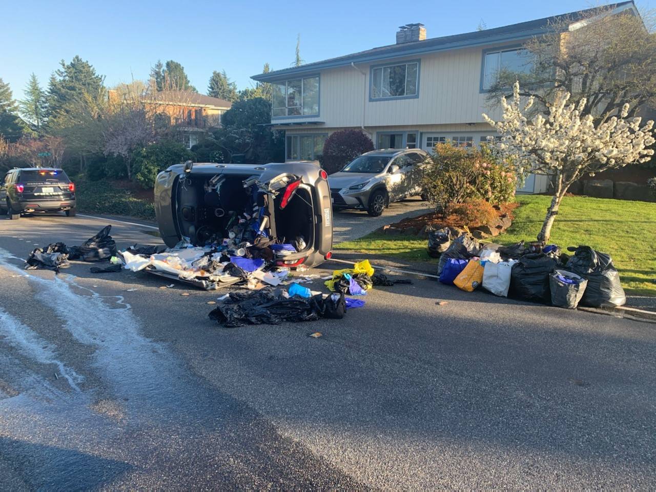 Mercer Island’s police and fire departments were on the scene of a rollover accident in the 9300 block of Mercerwood Drive on April 14. Photo courtesy of the Mercer Island Police Department