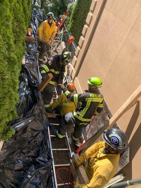 Fire crews rescue a construction worker after a trench collapsed on May 7. Photo courtesy of the Mercer Island Fire Department