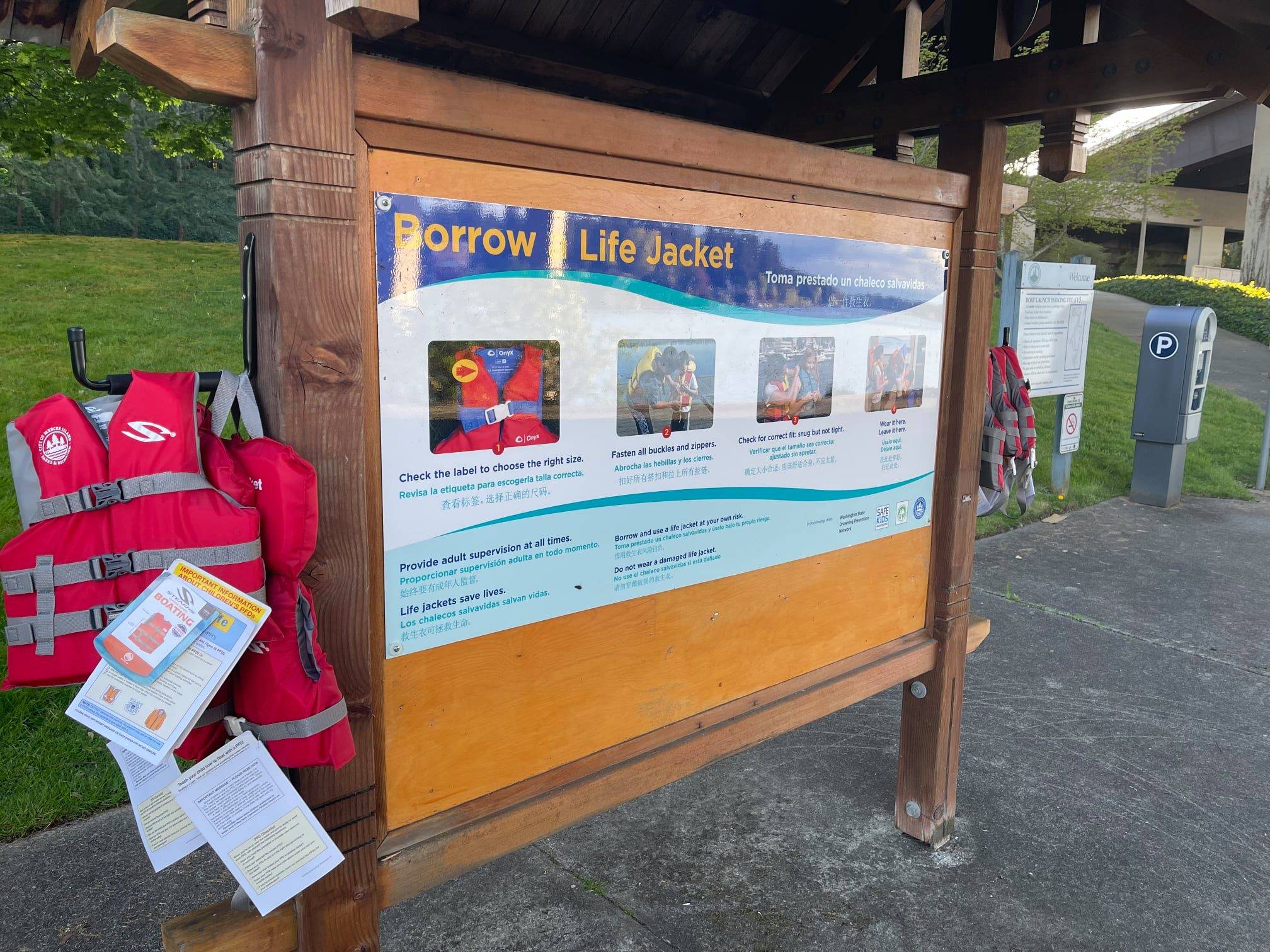 The city of Mercer Island received help from a community volunteer to obtain a grant to purchase and supply a Donor Life Jacket Station at the boat launch. Volunteers worked with Seattle Children’s Hospital Drowning Prevention Network to outfit these stations with placards and life jackets, which are available for people to borrow when they are at the lake and return when they are finished using them. The city plans to place three more stations in Island water-accessible parks in the future. Photo courtesy of the Mercer Island Police Department