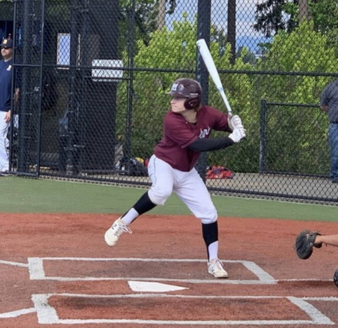 Mercer Island High School’s Nathan Buchan swings away in a game two seasons ago. Photo courtesy of Andre Marshall/ Boost Baseball