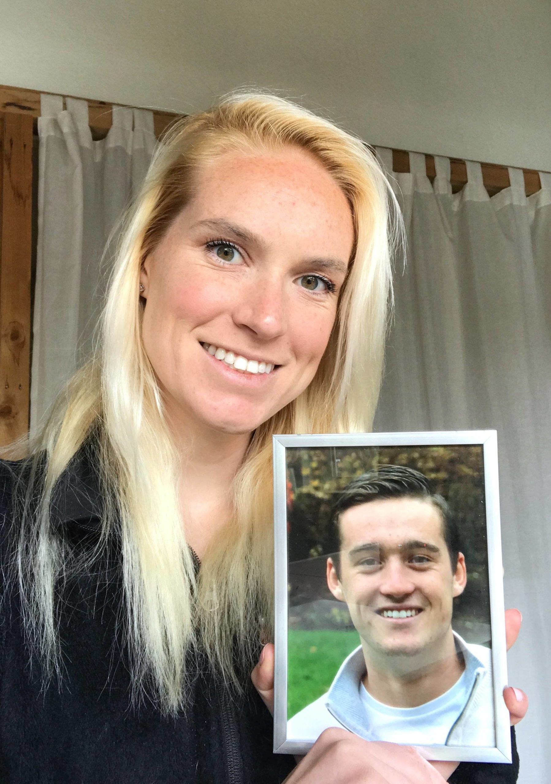 Kasey Taylor holds a photo of her brother Will, who died by suicide on March 4, 2017. Photo courtesy of Kasey Taylor