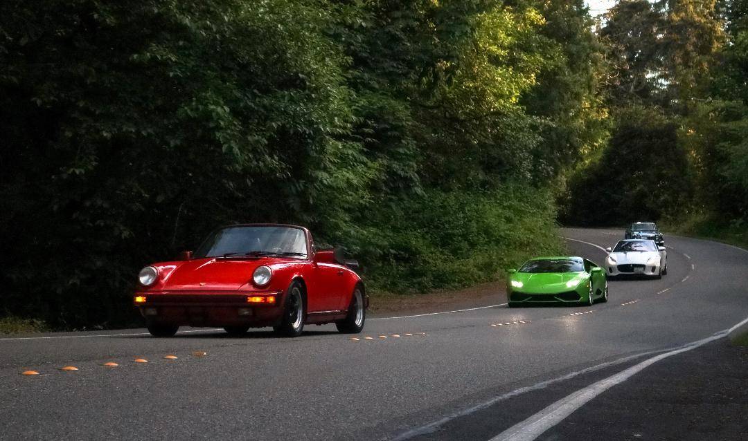 Cars cruise around one of the many curves during the Mercer Island 2020 event. Photo courtesy of Tom Alberts
