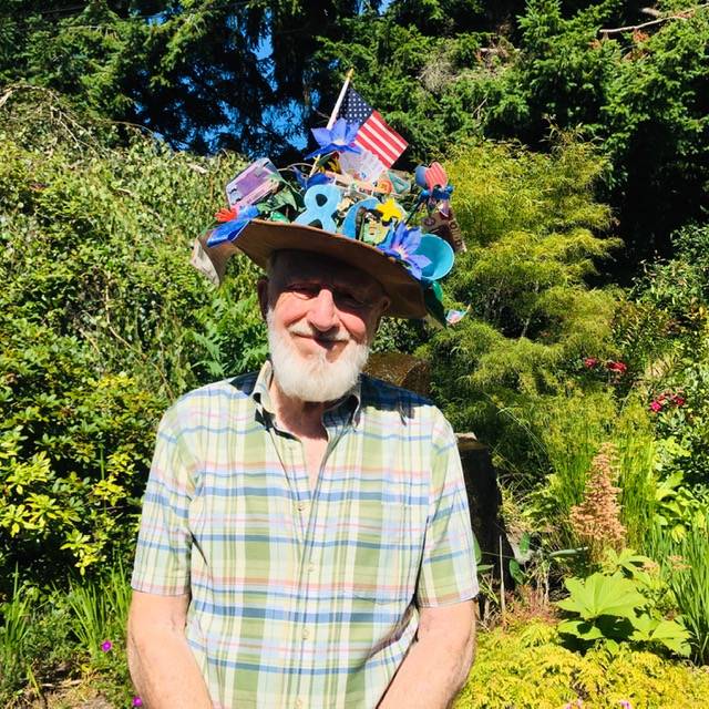 Gordon Polson frequently dons this eye-catching hat at the Mercer Island Farmers Market. He received the flashy head wear on his 80th birthday from the kids at the badminton club he ran for 28 years at the old North Mercer Gym. Photo courtesy of Gordon Polson