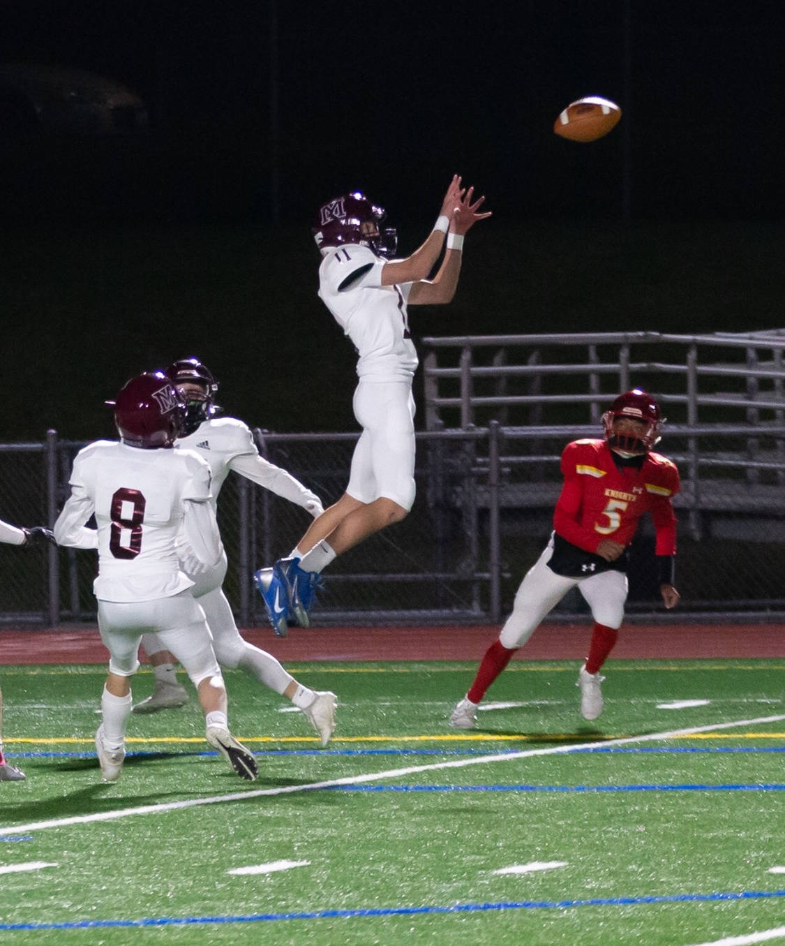 Mercer Island High School’s Garrett Rogan leaps for the ball in a game last season. Photo courtesy of David Wisenteiner