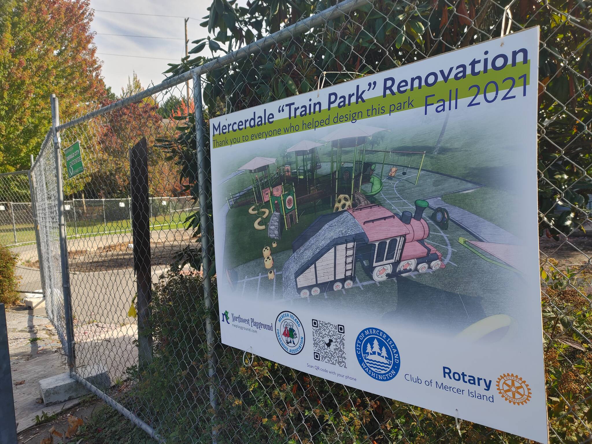 A colorful sign of appreciation includes a rendering of the Mercerdale Park playground renovation project at the site at 3009 77th Ave. SE. Andy Nystrom/ staff photo