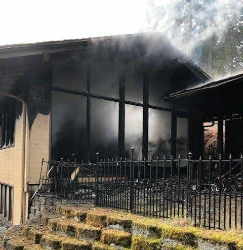 This home on Southeast 82nd Avenue was engulfed in flames on Oct. 18 before firefighters safely contained the blaze. Photo courtesy of the Mercer Island Fire Department