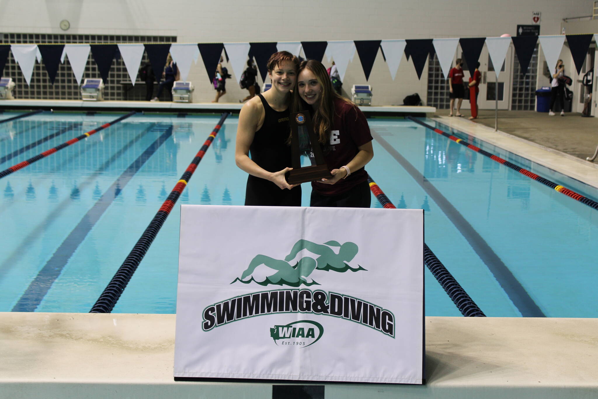 Mercer Island High School 3A state individual champions, Piper Enge (200-yard individual medley and 100-yard breaststroke) and Brooke Andrews (diving). Courtesy photo