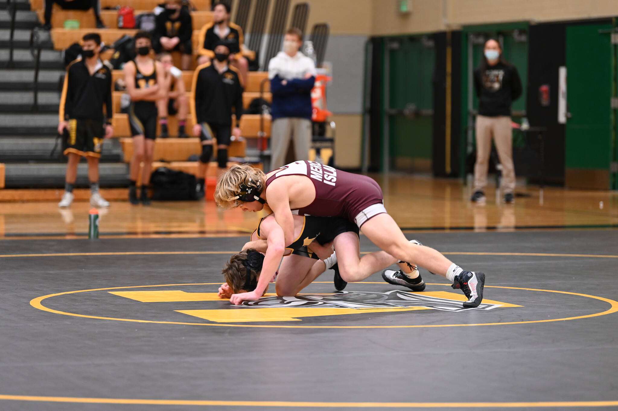 Mercer Island High School’s Lincoln Woods wrestles an Inglemoor High School opponent on Dec. 2. Woods won by a fall at 2:30. Courtesy photo