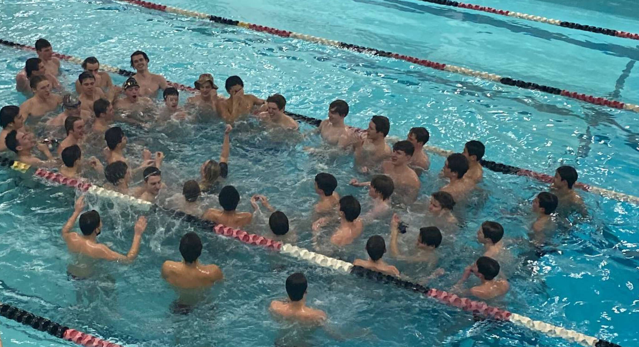 Mercer Island High School’s boys swim and dive team gears up for its senior night meet. Photo courtesy of Logan Jerome