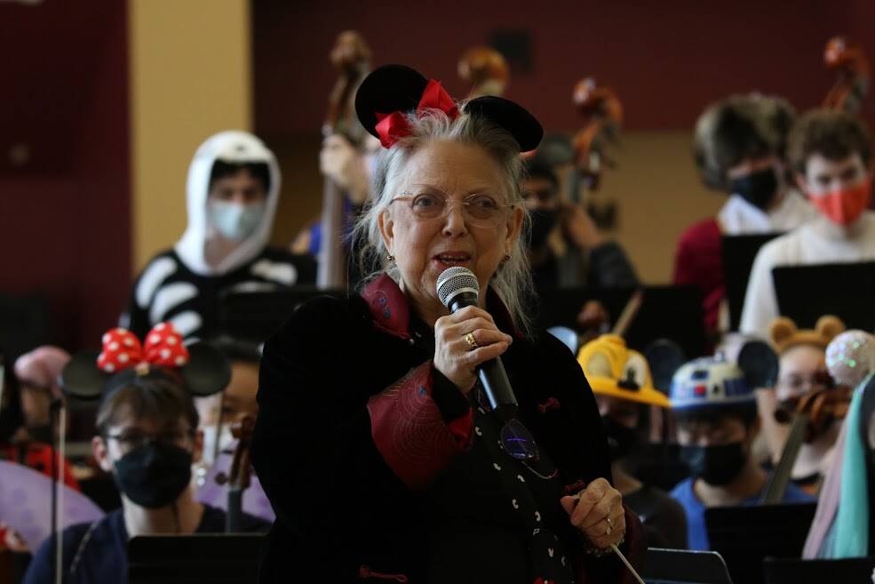 Longtime Mercer Island orchestra director Vicki White-Miltun addresses the crowd at the Disney and Dessert Fundraising Event on March 6 in the Mercer Island High School commons. Photo courtesy of Bao-Tran Nguyen