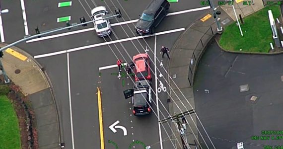 Guardian One footage from January 2022 shows an Issaquah police officer attempting to remove suspect from stolen vehicle but gets run over in the process. Courtesy of King County Sheriff’s Office Air Support