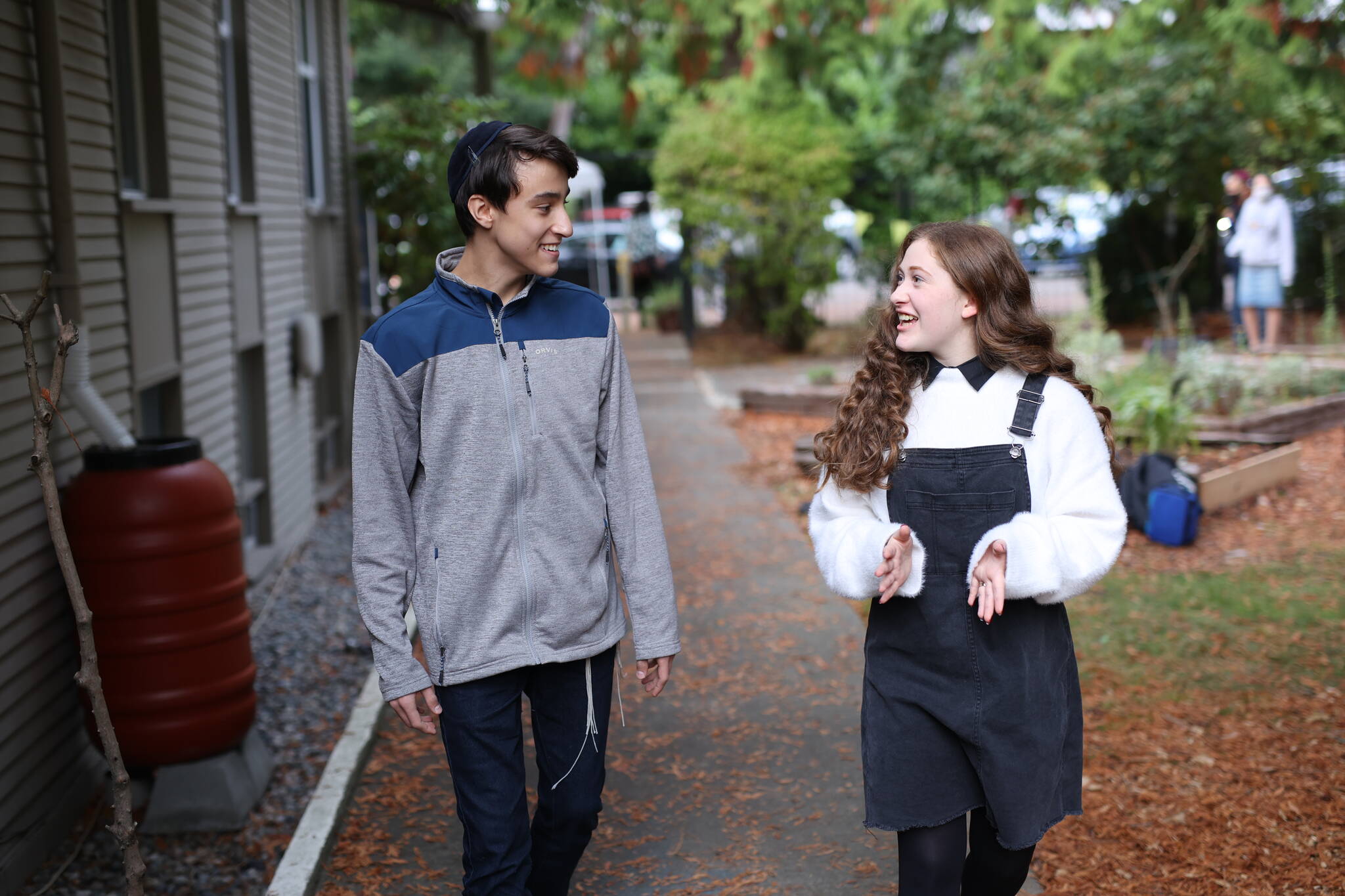 Northwest Yeshiva High School students Max Kutepov and Ariana Balkany stroll through the Mercer Island campus. Courtesy of David Jacoby