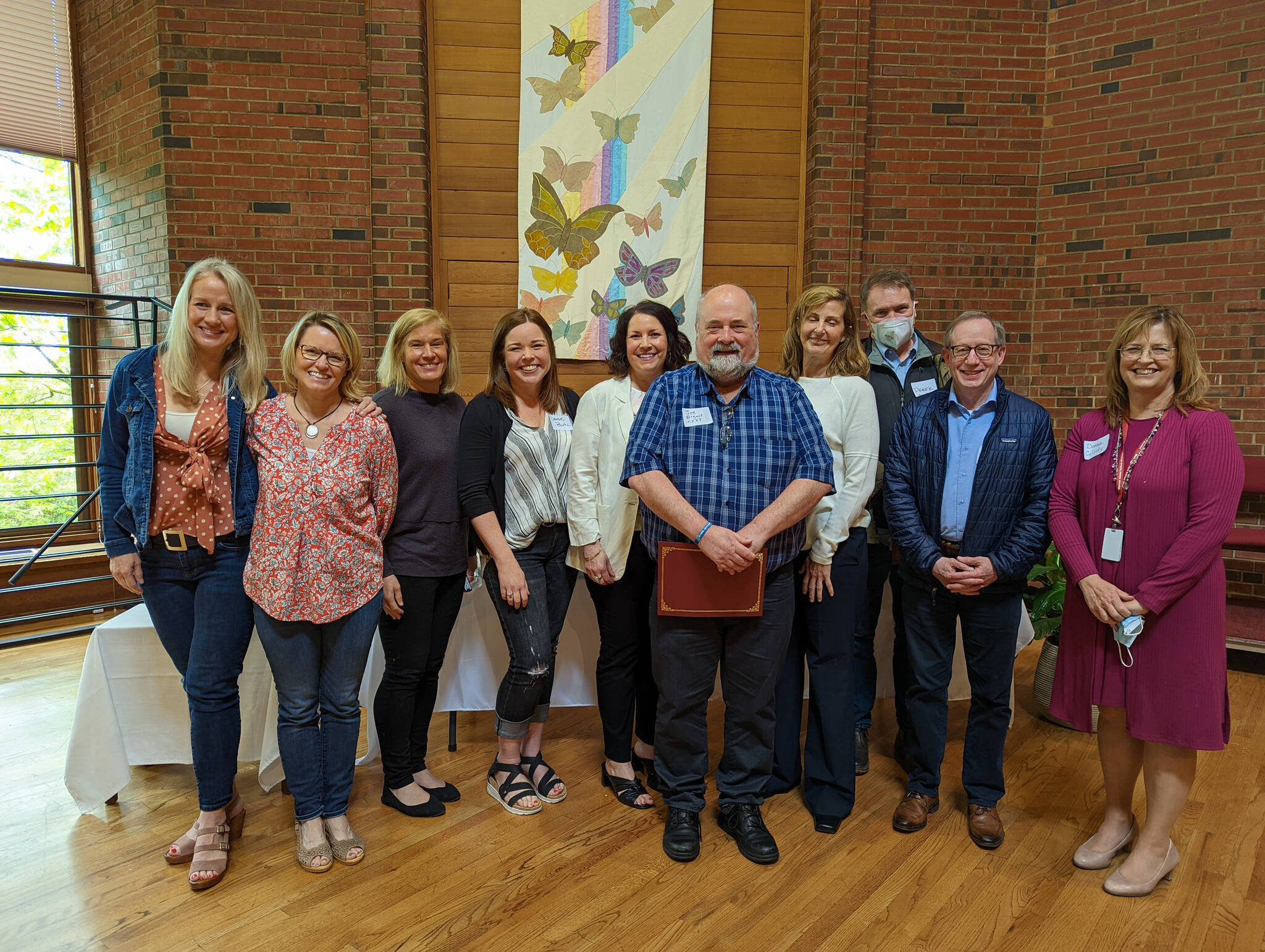 From left to right are some of the Mercer Island PTA Council award recipients: Tanya Aggar, Michelle Ritter (MI Parent Edge), Krista Wells (MI Martial Arts), Debbie Burke, Stephanie Parmenter, Joe Bryant, Amy Richter, Derek Franklin (Mercer Island Youth and Family Services), David Hoffman and Donna Colosky. Photo courtesy of Lekshmi Radhakrishnan