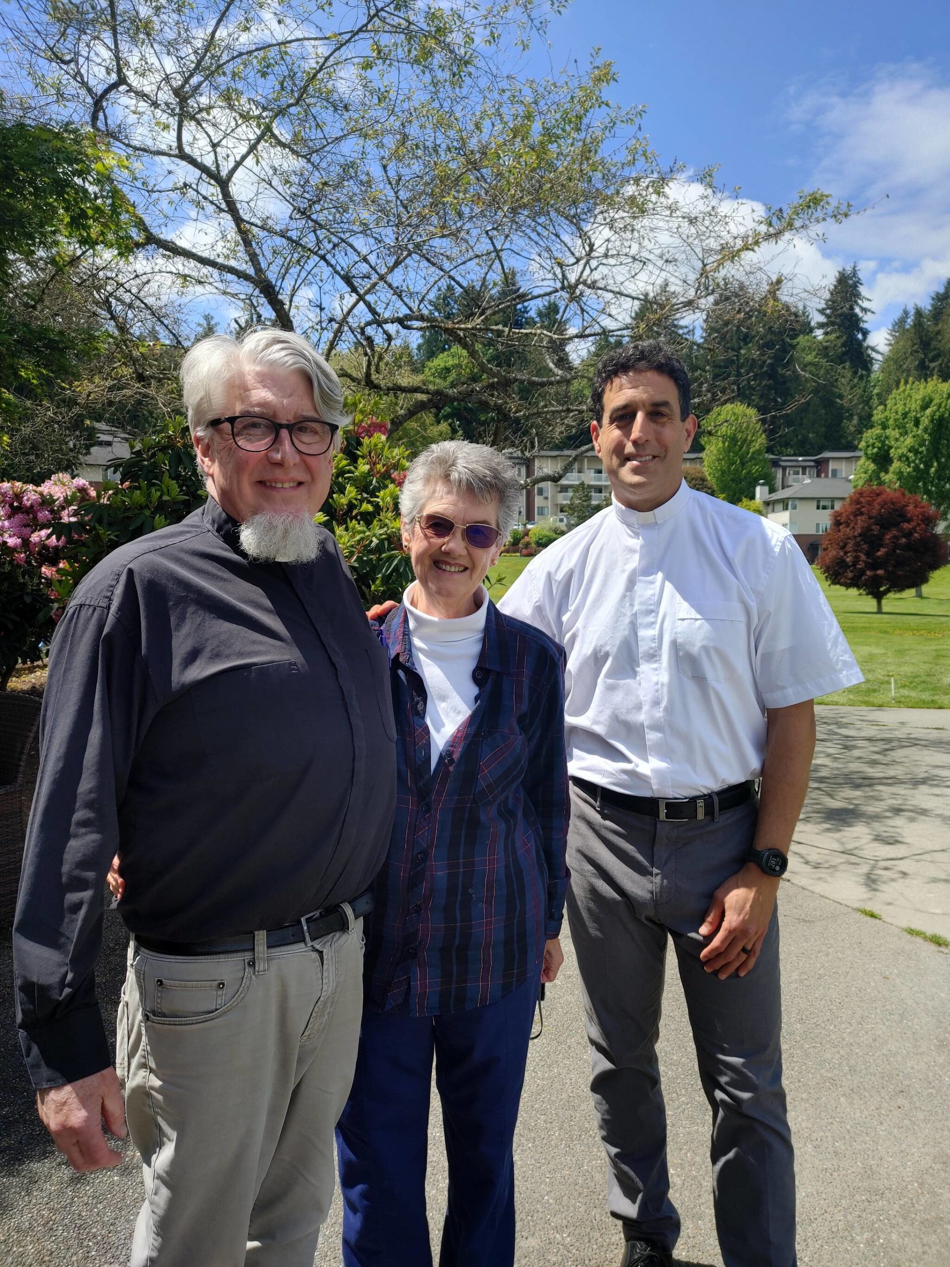 From left to right: Retired Operation Nightwatch executive director Rev. Rick Reynolds, Mercer Island resident Donna Palmberg (widow of Bud, the organization’s founder) and new executive director Frank DiGirolamo, deacon of St. Monica Catholic Church parish, gather at Covenant Living at the Shores on Mercer Island. Andy Nystrom/ staff photo