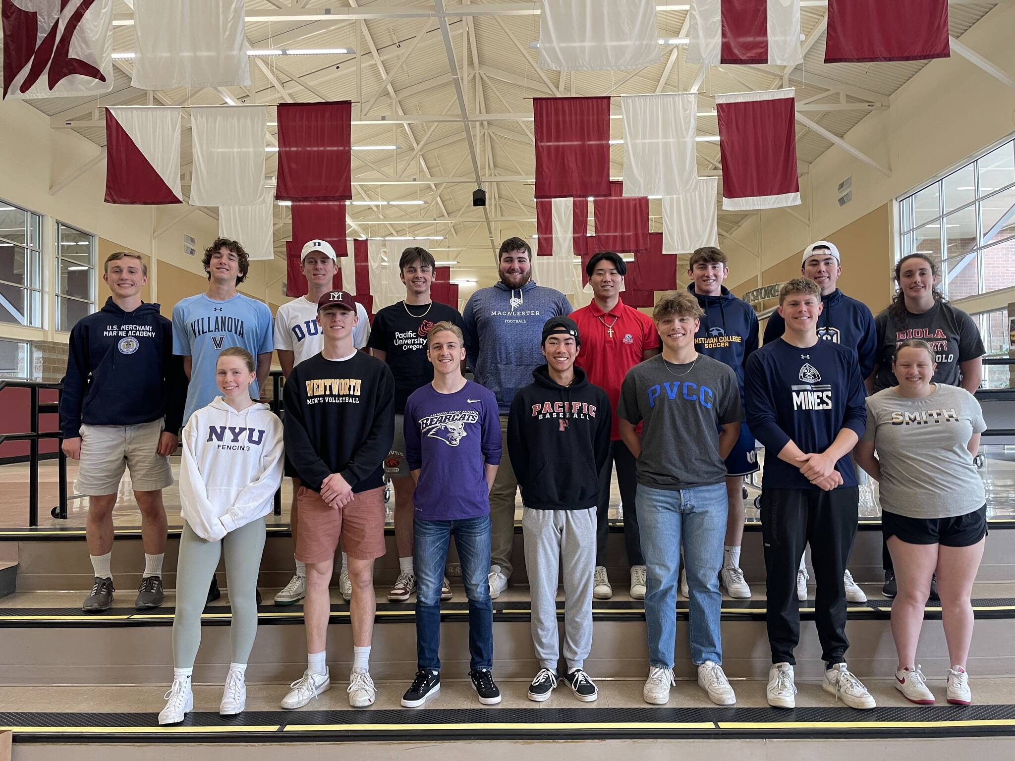 Sixteen Mercer Island High School seniors signed their national letters of intent on June 7 to play collegiate athletics. The event took place in the high school lower commons. The student-athletes are: Benjamin Moughon, volleyball, Wentworth Institute of Technology; Brett Fitzwilson, football, Macalester College; Chase Shavey, football, U.S. Merchant Marine Academy; Cooper Gersch, soccer, Whitman College; Emily Guedel, water polo, Biola University; Ethan Evans, golf, Duke University; Garrett Rogan, football, Villanova; Governor Aufranc, baseball, Pacific University; Halen Otte, baseball, Whitman College; Jakson Winn, swimming, Colorado School of Mines; Jack Varney, baseball, Paradise Valley College; Jett Mai, baseball, Pacific University; Kaden Wu, baseball, Belmont University; Molly Seneker, swimming, Smith College; Nathan Iliuc, soccer, Southwest Baptist University; and Sophia Dondisch, fencing, New York University. Courtesy of the Mercer Island School District