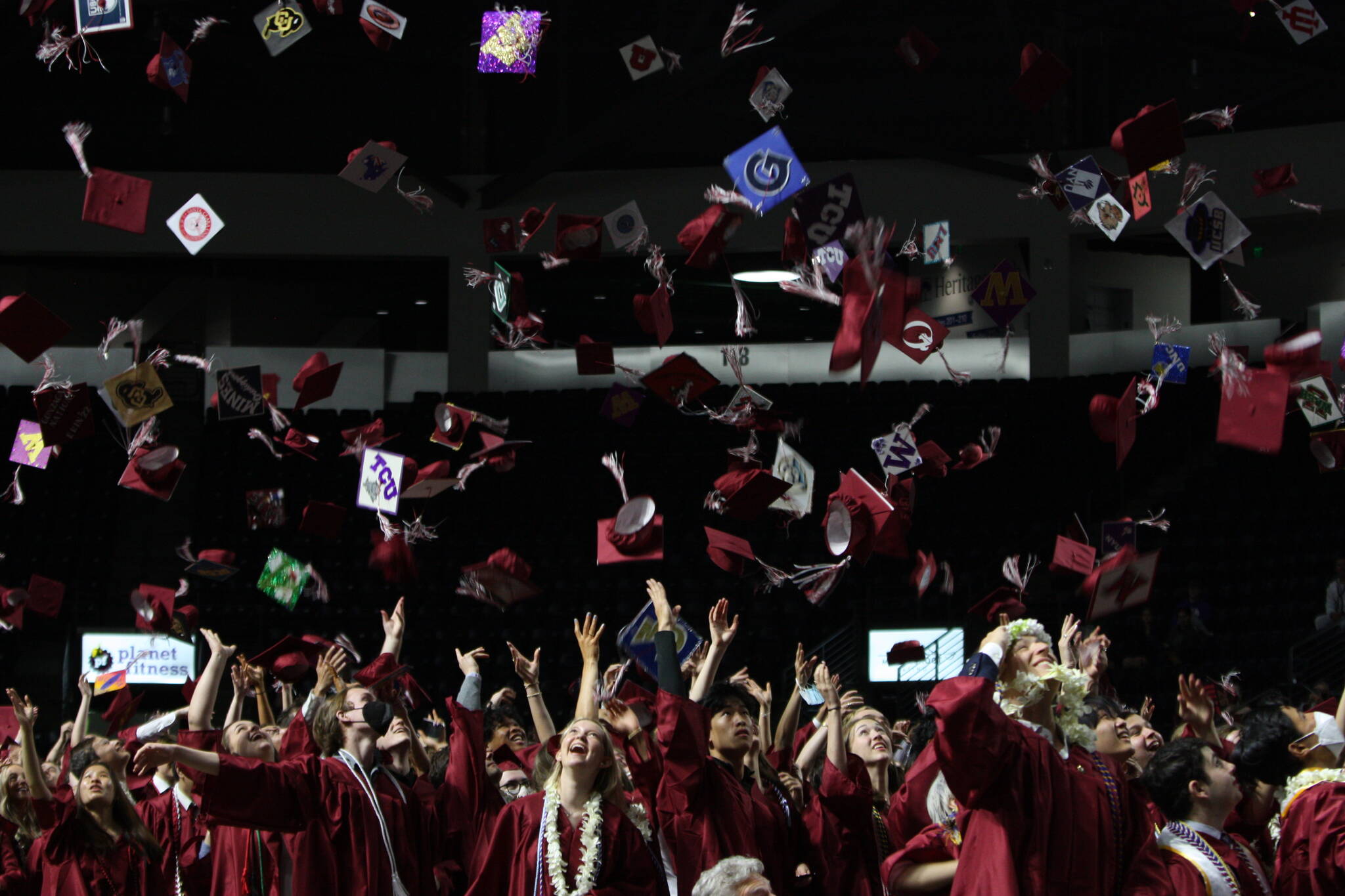 Graduation caps go flying at the Mercer Island High School commencement. Andy Nystrom/ staff photo