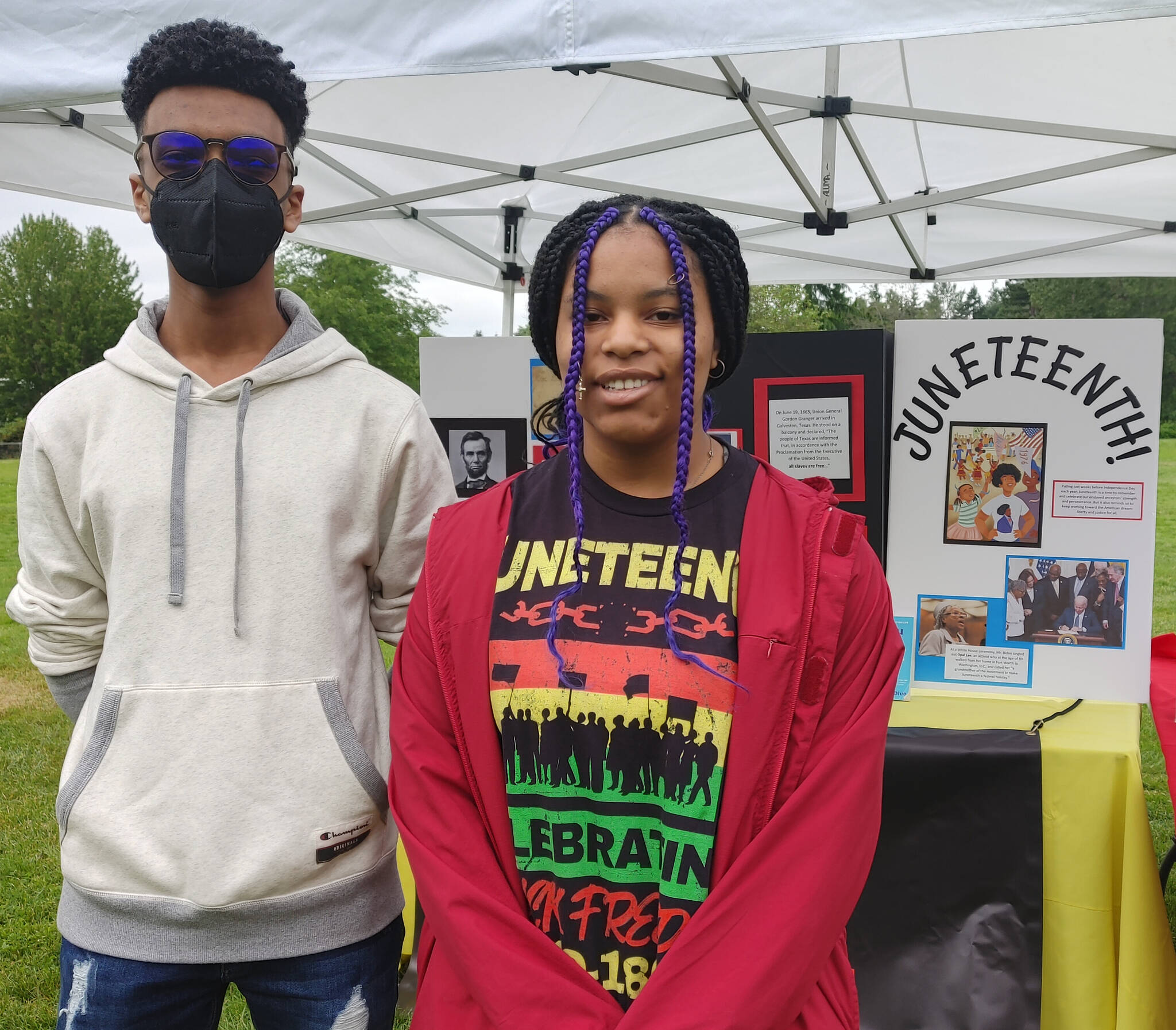 Mercer Island High School Black Student Union members Brooks Kahsai and Lea’Asia Lane at the Juneteenth Festival Black culture fair on June 19 at Mercerdale Park. Andy Nystrom/ staff photo