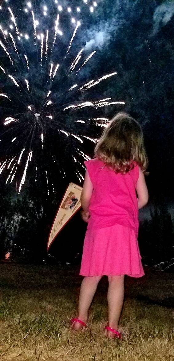 A young resident enjoys the Summer Celebration fireworks show in 2018. Courtesy of the city of Mercer Island