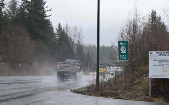 A State Route 18 sign in Snoqualmie before the SR 18/I-90 interchange. File photo Conor Wilson/Valley Record.