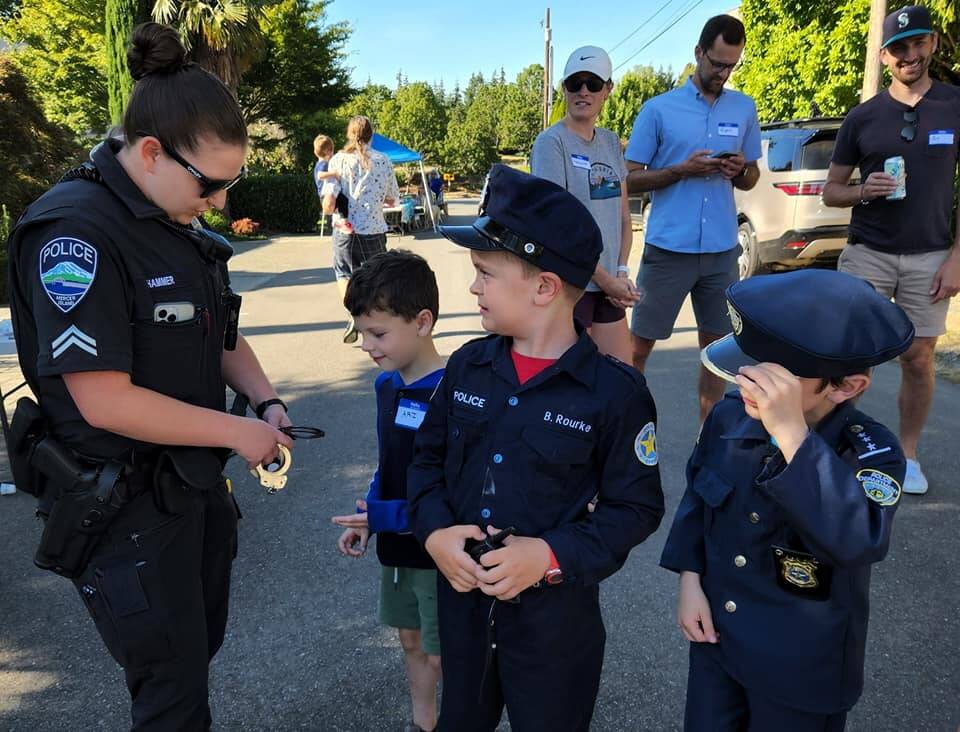 Mercer Island Police Department officers rolled out into city neighborhoods to meet with residents during National Night Out on Aug. 2 in an effort to strengthen community connection. Photo courtesy of the Mercer Island Police Department