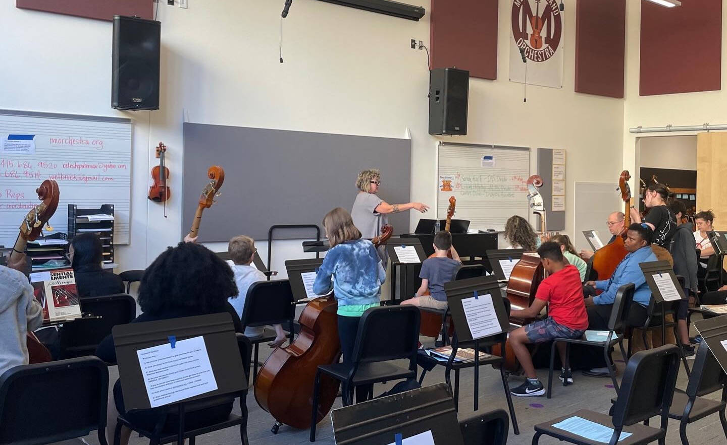 Mercer Island School District fifth-grade orchestra students run through their first lesson on Sept. 20, and several Mercer Island High School students also joined to assist students for the entire evening. Photo courtesy of the Mercer Island School District