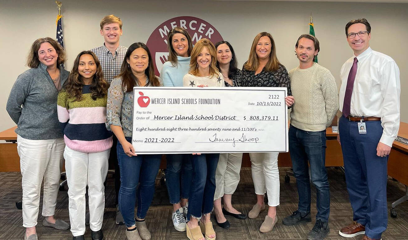 The Mercer Island Schools Foundation (MISF) presented a check for a grant in the amount of $808,379.11 to the Mercer Island School District at the board’s Oct. 13 meeting. “We so appreciate all that you do for our schools, students and staff,” reads a school district Facebook post. The money comes from community donations, and MISF’s fall phonathon will occur from Oct. 25-26. Pictured from left to right, board director Deborah Lurie, student board representative Asha Woerner, student board representative Andrew Howison, board director Tam Dinh, president of the MISF board of trustees Michelle Dumler, vice president of the MISF board of trustees Sheri Blumenthal, board president Maggie Tai Tucker, MISF executive director Tammy Shoop, board director Dan Glowitz and superintendent Fred Rundle. Photo courtesy of the Mercer Island School District