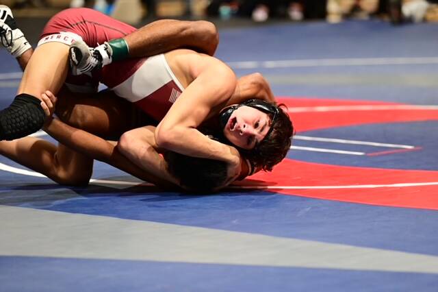 Mercer Island High School’s Chase Warnick wrestles at the 3A Region 4 tournament. Photo courtesy of Aaron Koopman