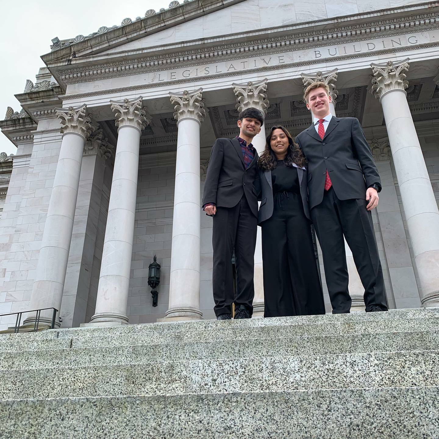 Mercer Island High School district school board student representatives Andrew Howison and Asha Woerner (right and center) and the school’s student board representative to the Puget Sound Educational Service District Mustafa Agha participated in the Day on the Hill conference on Feb. 27 in Olympia. Photo courtesy of the Mercer Island School District