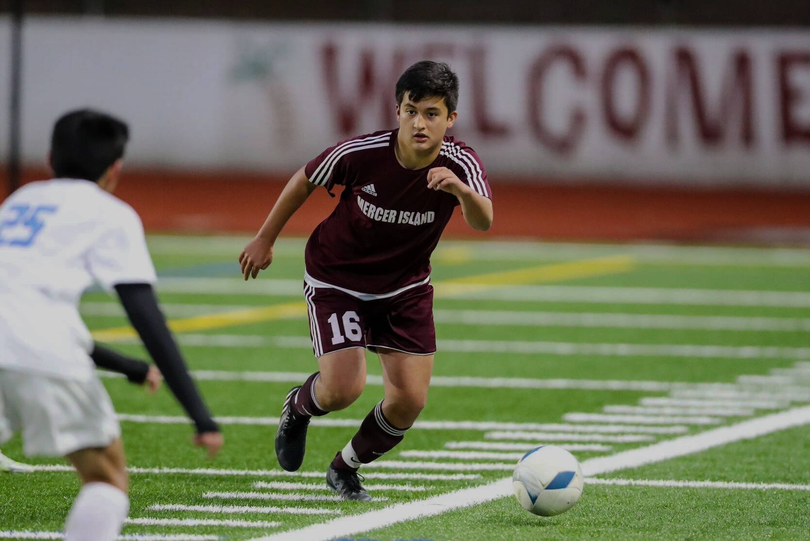 Mercer Island High School’s Samir Lumba, a senior captain and center back, dribbles the ball up field. Photo courtesy of Rick Edelman