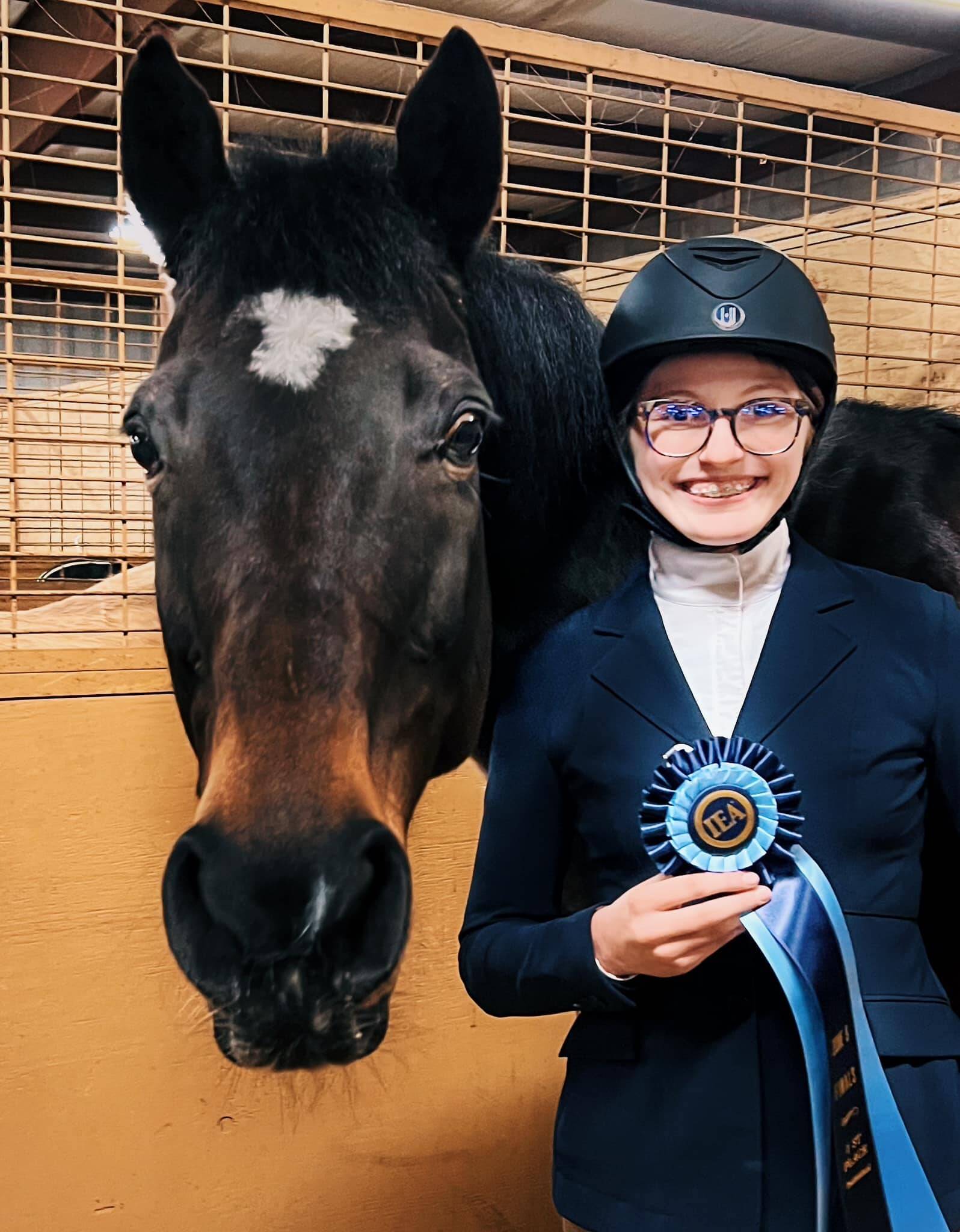 Mercer Island High School freshman Harper Hood placed first at the recent Interscholastic Equestrian Association (IEA) Zone 9 Hunt Seat competition in Lynden. With the win, she advances to the national finals at the Tryon International Equestrian Center in Tryon, North Carolina, from April 26-30. At the unique IEA showings at the local, regional, zone and national levels, riders draw their horses instead of bringing their own. Photo courtesy of the Mercer Island School District