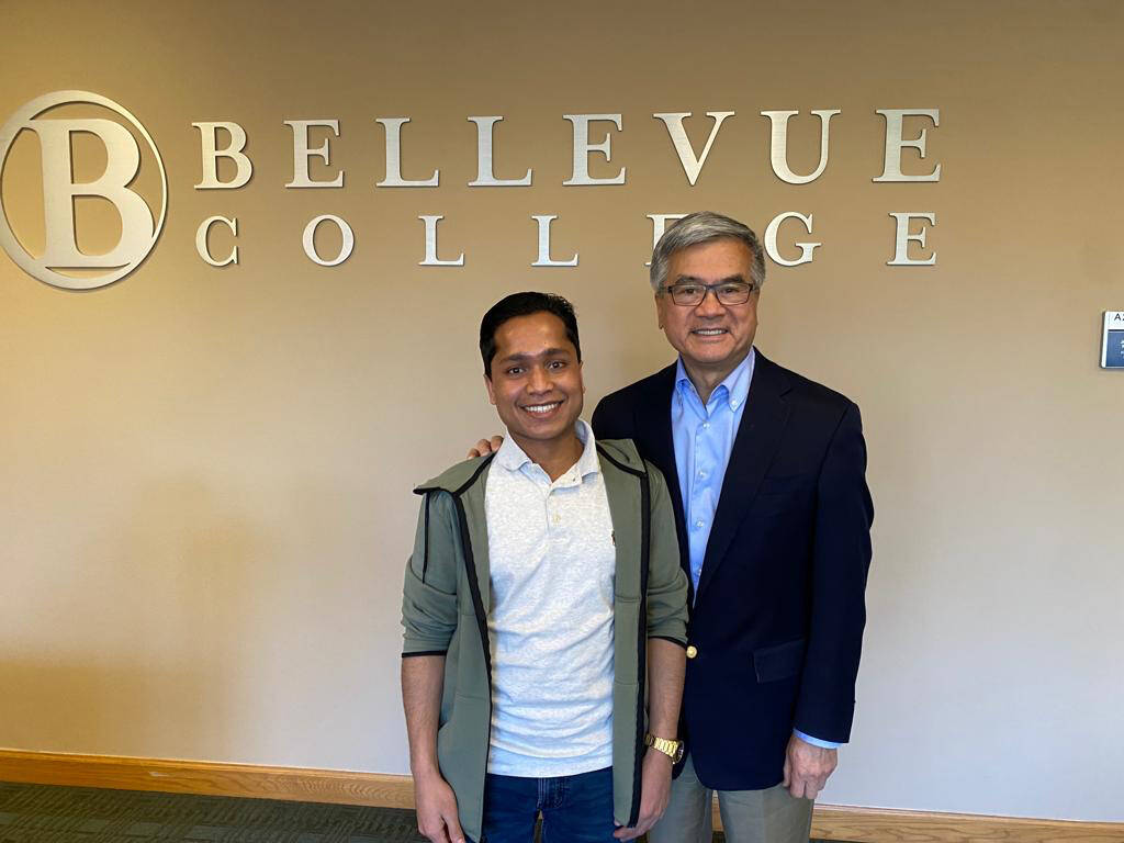 Mohamad Imran stands next to Gary Locke, Bellevue College interim president and former Washington state governor. Photo courtesy of Bellevue College