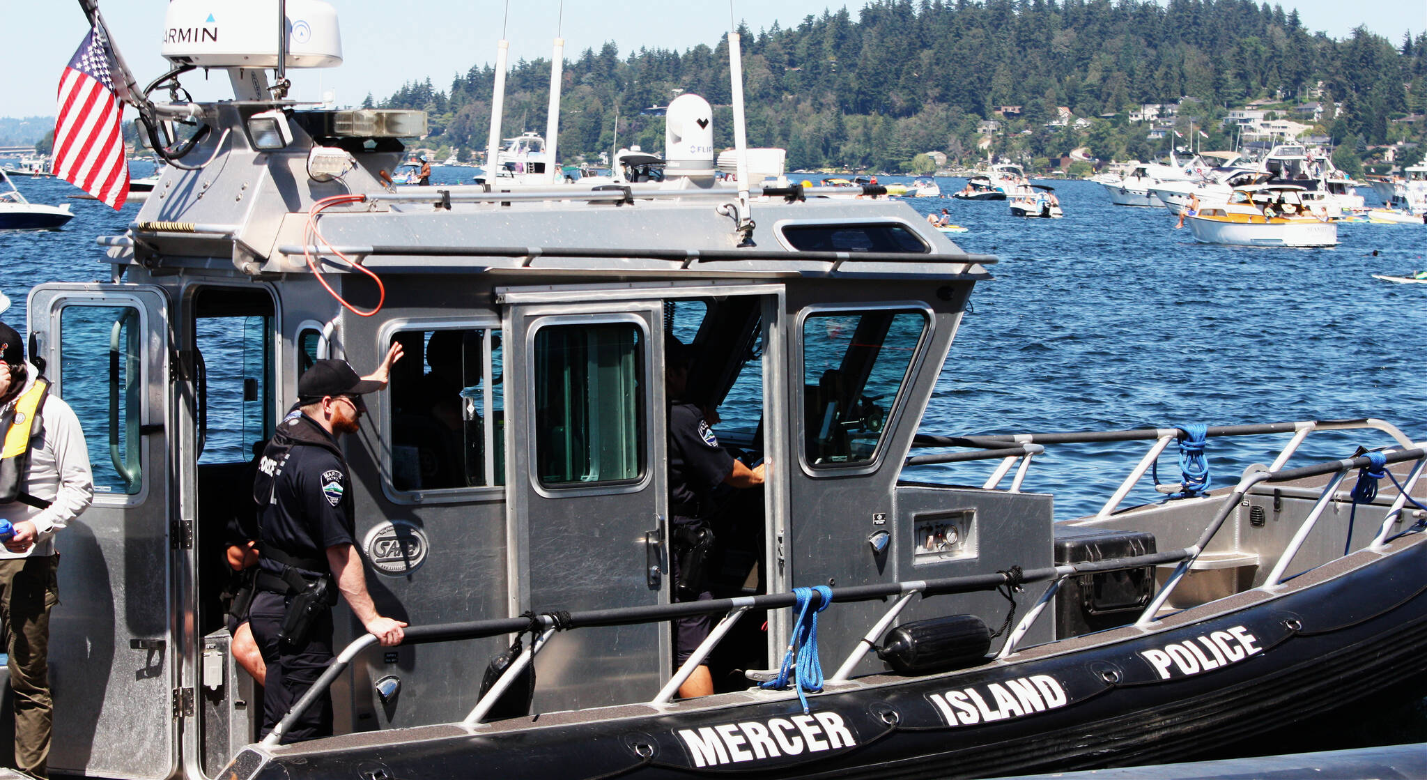 Mercer Island Police Department Marine Patrol officers will offer life jacket fittings and boater safety tips from 2-5 p.m. on May 20 at Mercerdale Park. Here, officers patrol Lake Washington during Seafair on Aug. 7, 2022. Reporter file photo