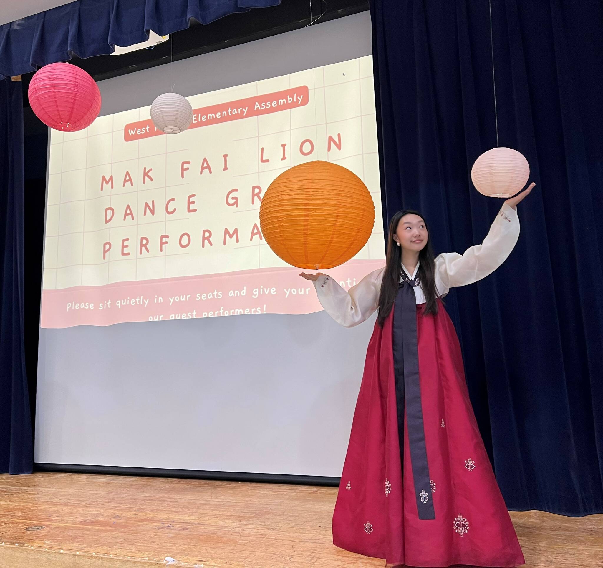 Mercer Island High School junior Grace Go wearing a traditional Korean hanbok during the AANHPI Heritage Month assembly at West Mercer Elementary on May 24. Photo courtesy of Soyun Chow