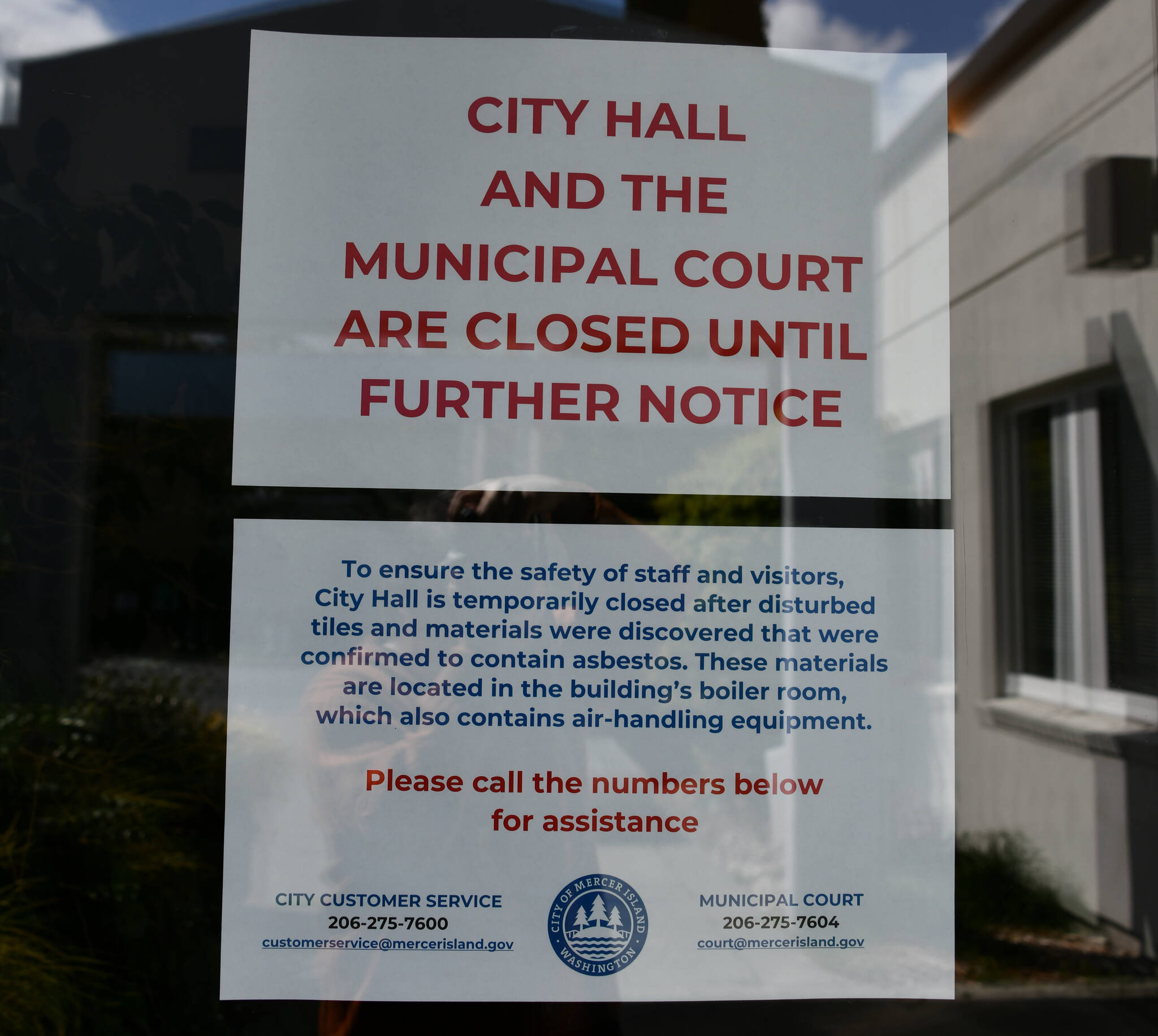 Mercer Island City Hall has been closed since April 17 after asbestos-contaminated broken tiles were discovered in the boiler room. Photo from April 18. Andy Nystrom/ staff photo