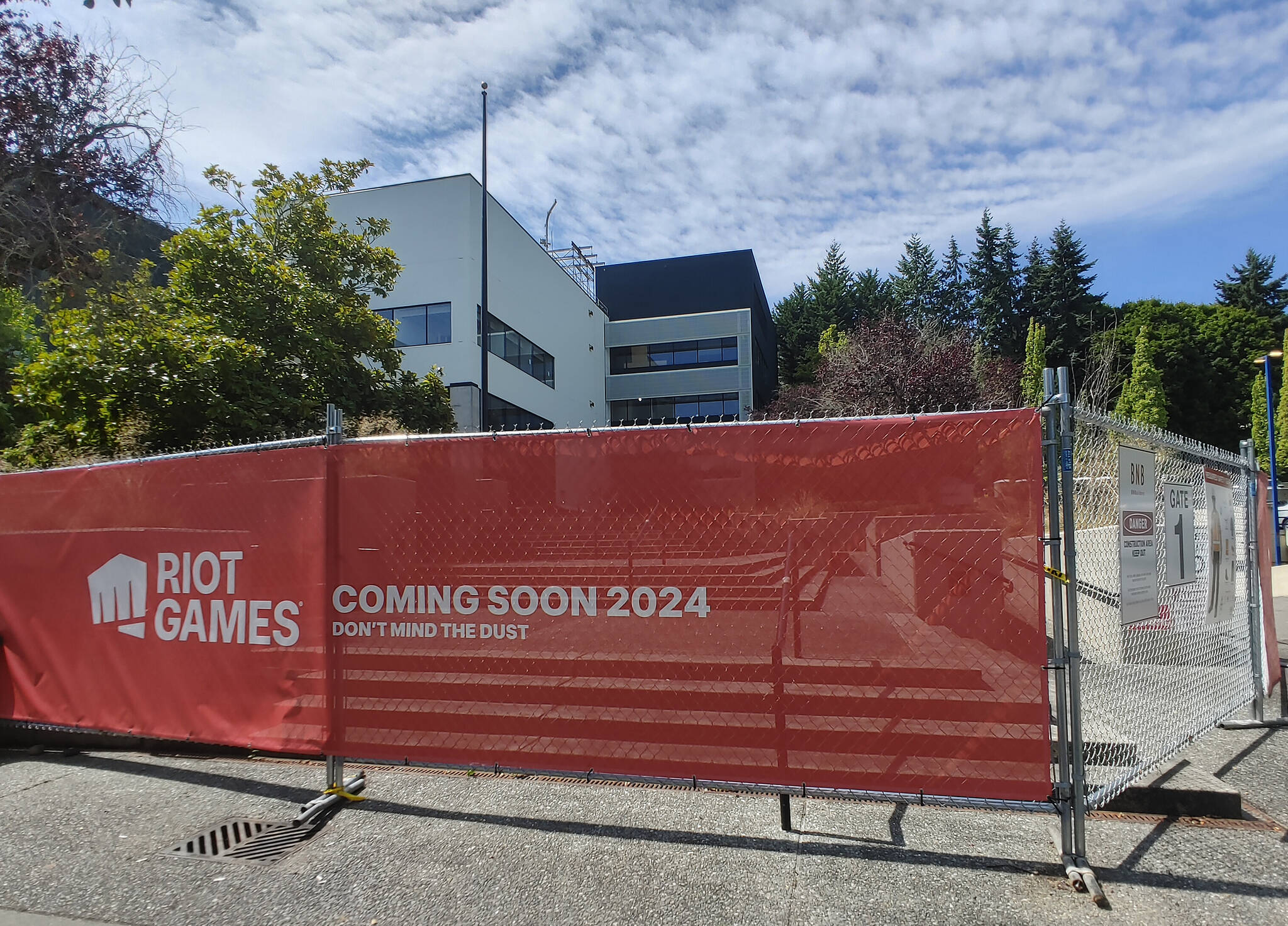 The Riot Games building peeks out from behind fencing at 3003 77th Ave. SE. Andy Nystrom/ staff photo