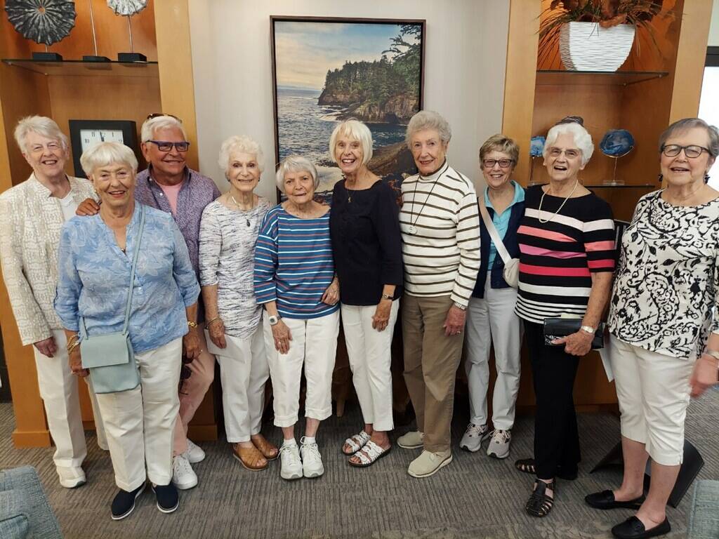 Residents of Covenant Living at the Shores on Mercer Island gather with longtime hairstylist Ray Noble at his 81st birthday party on July 11. Courtesy photo